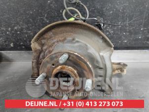 Daihatsu Cuore Fusee rechts-voor O643115 foto 2