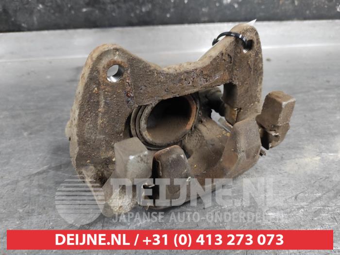 Daihatsu Cuore Bremszange links vorne O643116