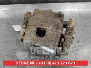 Daihatsu Cuore Bremszange links vorne O643116 foto 2