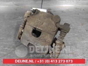 Daihatsu Cuore Bremszange rechts vorne O643117 foto 2