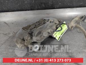 Toyota Hilux Front brake calliper, left O643309 photo 3