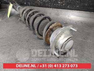 Daihatsu Sirion Front shock absorber rod, left O643952 photo 2
