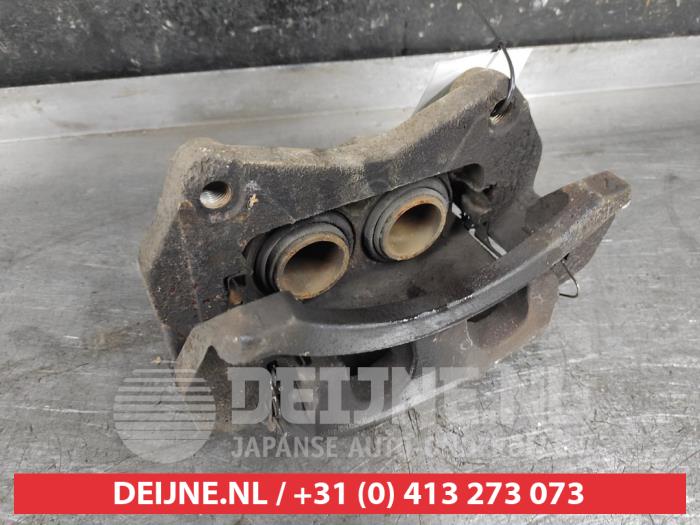 Nissan X-Trail Remklauw (Tang) links-voor O644116