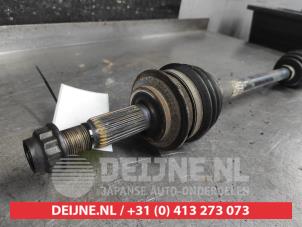 Toyota Yaris Front drive shaft, left O644391 photo 2