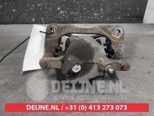 Suzuki SX-4 Remklauw (Tang) links-voor O644440 foto 2