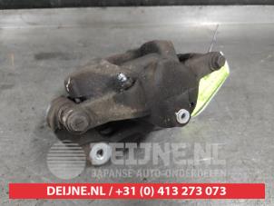 Toyota Avensis Front brake calliper, left O644590 photo 3