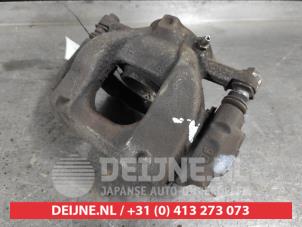 Toyota Avensis Front brake calliper, left O644590 photo 2
