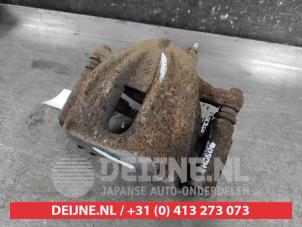 Toyota Avensis Front brake calliper, left O644660 photo 2