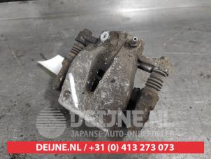 Toyota Avensis Rear brake calliper, left O644663 photo 2