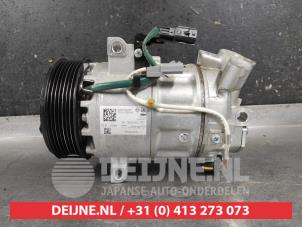Gebruikte Pomp Airco Mitsubishi Colt 1.0 MPi 12V Prijs € 350,00 Margeregeling aangeboden door V.Deijne Jap.Auto-onderdelen BV