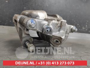Mitsubishi Colt Bremszange links vorne O645100 foto 3
