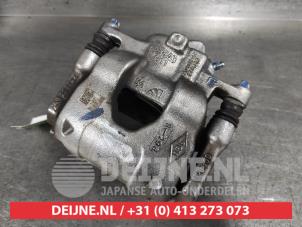 Mitsubishi Colt Bremszange links vorne O645100 foto 2