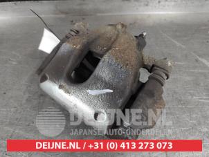Toyota Auris Bremszange links vorne O645177 foto 2