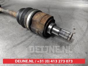 Hyundai I30 Aandrijfas links-voor O646111 foto 3