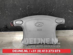 Hyundai Atos Left airbag (steering wheel) O646405 photo 2