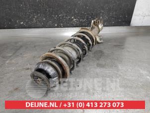 Nissan Micra Stoßdämpferstrebe links vorne O646442 foto 2