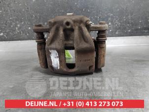 Nissan Micra Bremszange links vorne O646445 foto 3