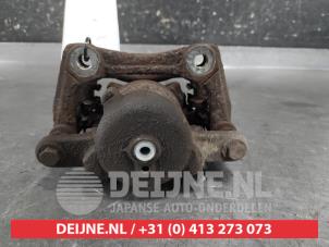 Nissan Micra Bremszange links vorne O646445 foto 2