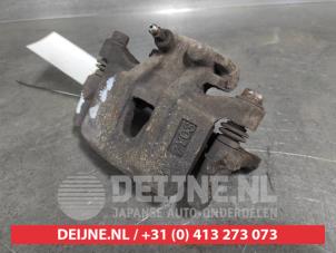 Mitsubishi Grandis Rear brake calliper, left O646779 photo 2