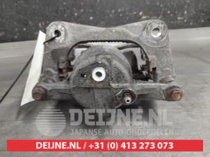 Toyota Corolla Bremszange links vorne O646905 foto 2