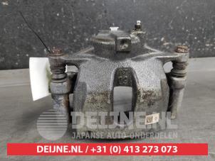 Toyota Corolla Bremszange links vorne O646905 foto 3