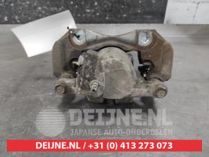 Toyota Prius Plus Bremszange links hinten O647068 foto 2