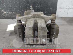 Toyota Prius Plus Bremszange links hinten O647068 foto 3