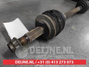 Toyota Auris Aandrijfas links-voor O647319 foto 2