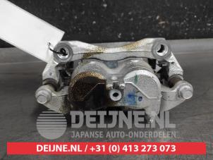 Nissan Leaf Remklauw (Tang) links-voor O647808 foto 2