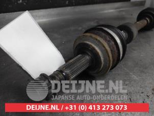Toyota Avensis Front drive shaft, left O648516 photo 2
