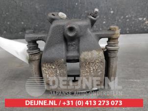 Suzuki Swift Front brake calliper, left O649279 photo 3