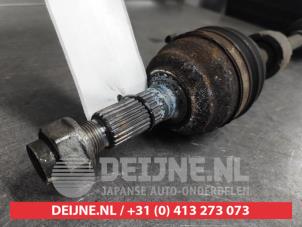 Daihatsu Sirion Front drive shaft, left O649389 photo 2