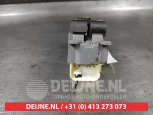 Toyota Yaris Multi-functional window switch O650479 photo 2