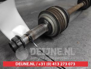 Toyota Verso-S Front drive shaft, left O650644 photo 2