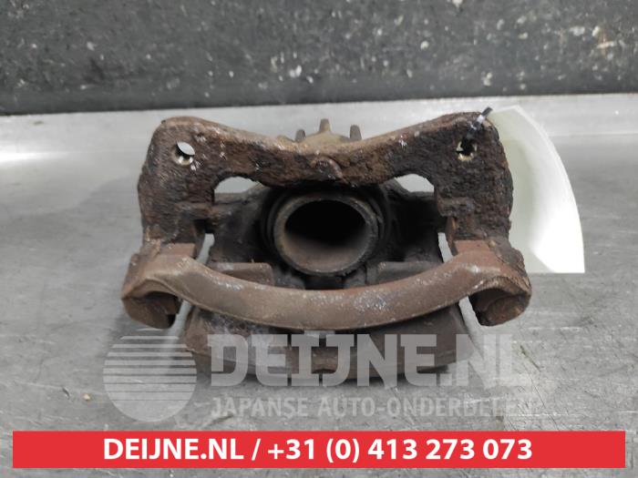 Mitsubishi Space Star Bremszange links vorne O650717