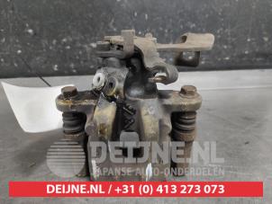 Toyota Yaris Rear brake calliper, left O650796 photo 3