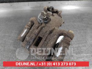 Hyundai IX20 Bremszange links hinten O650997 foto 2
