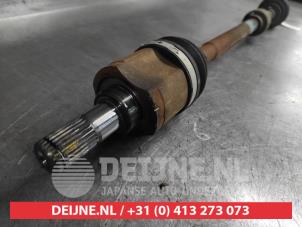 Kia Rio Aandrijfas rechts-voor O651058 foto 2