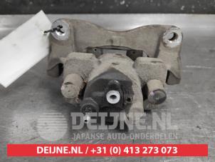 Toyota Yaris Front brake calliper, right O651451 photo 2