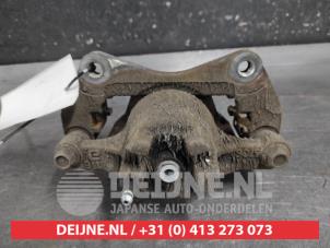 Mitsubishi Lancer Front brake calliper, right O652635 photo 2