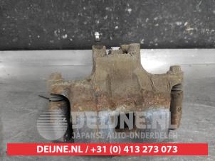 Mitsubishi Lancer Front brake calliper, right O652635 photo 3
