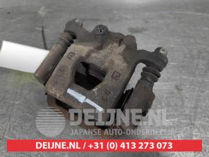 Nissan Qashqai Rear brake calliper, left O652725 photo 2
