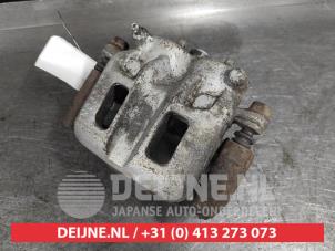 Mitsubishi Pajero Bremszange links vorne O652994 foto 2