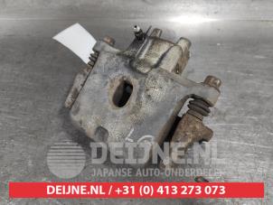 Mitsubishi Pajero Rear brake calliper, left O653052 photo 2