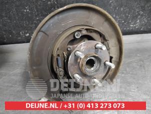 Subaru Forester Achsschenkel rechts hinten O653699 foto 2