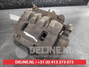 Subaru Forester Front brake calliper, left O653702 photo 2