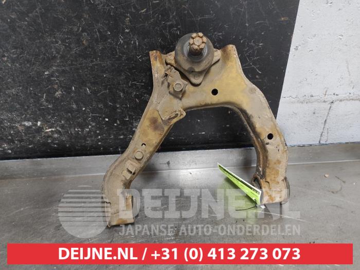 Mitsubishi Pajero Front upper wishbone, left O655308
