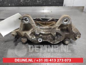 Mitsubishi Pajero Bremszange links vorne O655344 foto 2