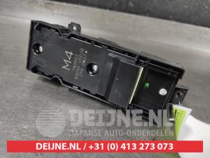 Toyota Yaris Multi-functional window switch O655545 photo 2