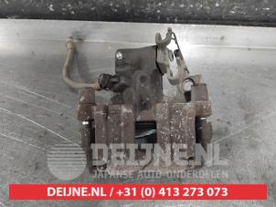 Toyota Yaris Bremszange links hinten O655742 foto 3